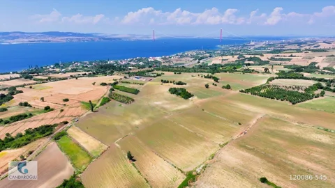 ÇANAKKALE LAPSEKİ SULUCA BOĞAZ VE KÖPRÜ MANZARALI SATILIK TARLA